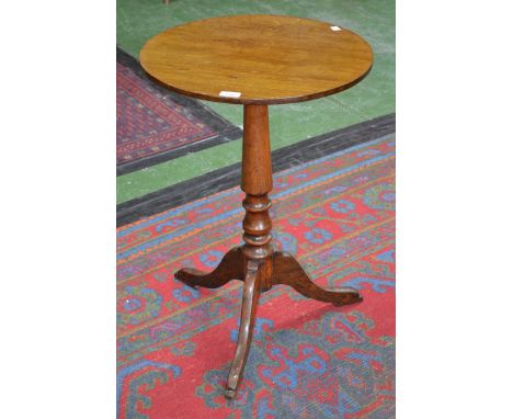 A 19th century tripod occasional table. 72cm high x 48.5cm diameter.