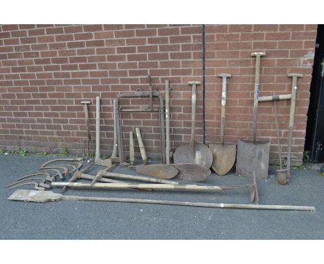 Vintage agriculture - a harpoon hay bale lifter; hay knives; assorted spades; hand sickles; a log roller cant hook; axes etc.