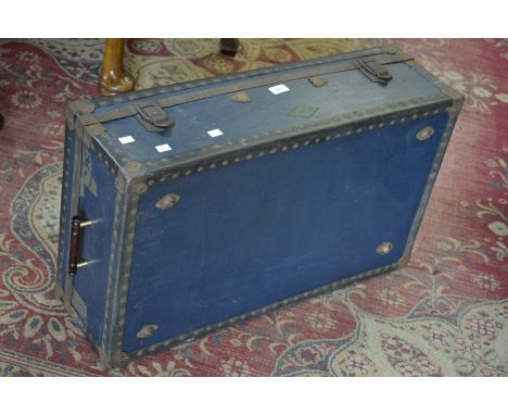 A vintage Overpond blue travelling trunk