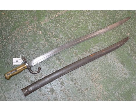 A 19th century French bayonet and scabbard, no.60581, c.1869