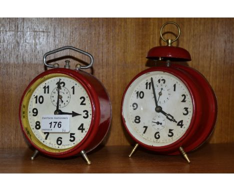 A 1950's red alarm clock; another (2)