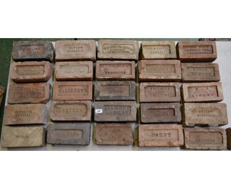 Architectural salvage - a collection of old bricks including H.E.Harold, Diseworth; Butterley Co., Waingroves; Ellistown; Den
