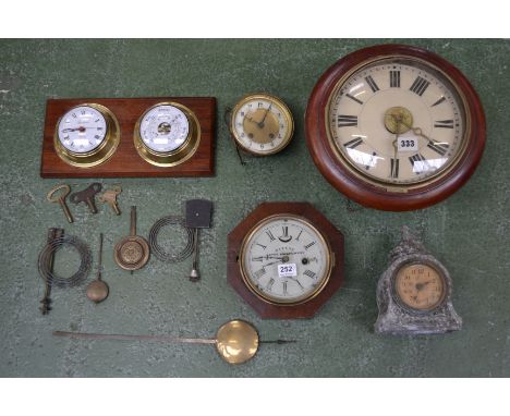 An oak patent lever escapement time piece, 30 hour movement, Marines by E.N.Welch; a wall barometer; others.