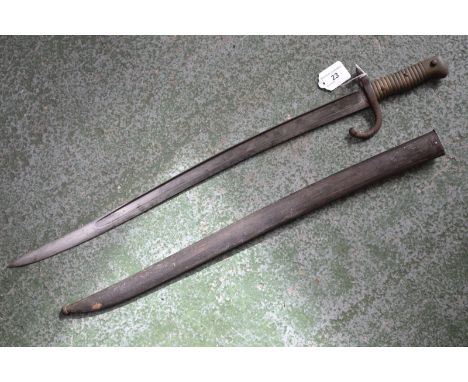 A 19th century French bayonet and scabbard, c.1874