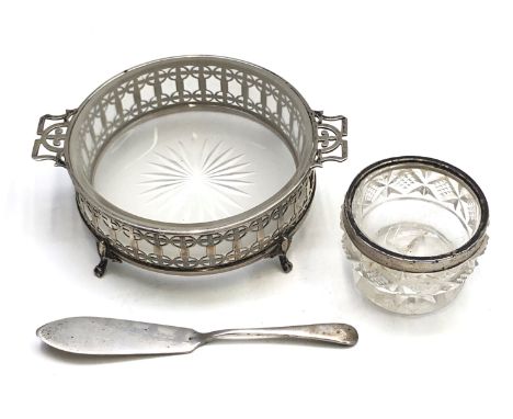 A pierced silver Mappin & Webb butter dish with cut glass liner and matching silver butter knife together with a silver mount