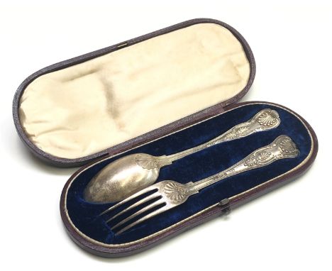 A King's pattern silver christening fork and spoon set, London, circa 1884, maker's mark GA, 2.1oz in tooled red leather box.
