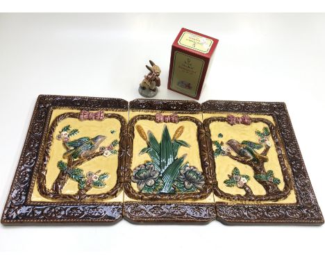 Three Victorian majolica style ceramic tiles, the two tiles decorated with birds 30cm x 21cm and the tile decorated with bull