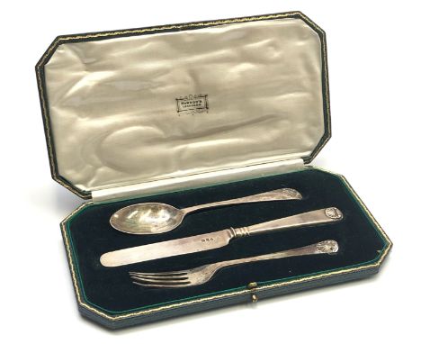 A silver knife, fork and spoon Christening set in Old English shell pattern by Harrods Ltd (Richard Woodman Burbridge) London