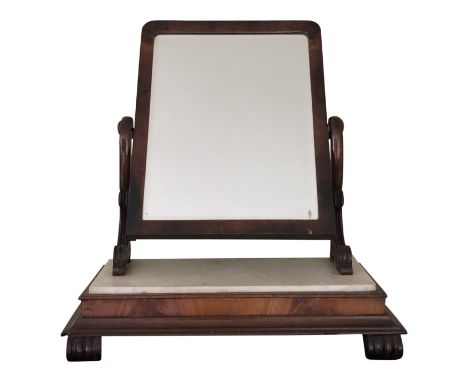 An early Victorian mahogany toilet mirror, the bevelled plate swings above a white marble inset.From the estate of Ashley Bar