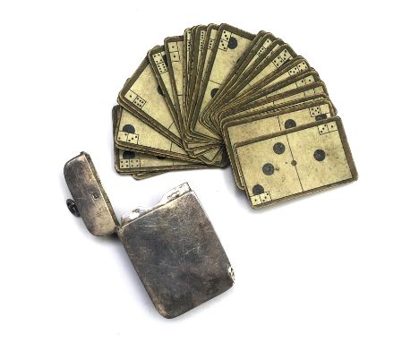 A rare dominoes set, the plain silver pocket case hallmarked Birmingham 1903, containing the set of printed card dominoes, th