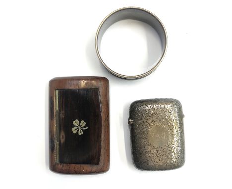 A silver napkin ring, a late Victorian silver Vesta case and a snuff box.