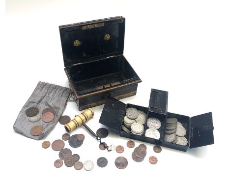 A black lacquer and brass bound box, fitted with a brass lock, together with a bone handle corkscrew and miscellaneous coins,