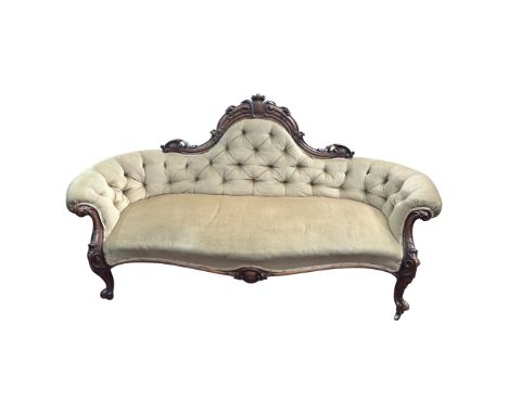 A Victorian walnut upholstered sofa, height 95cm, width 194cm. 