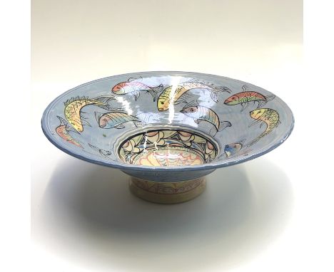 A large hand-painted ceramic bowl by John Gibson, decorated with coloured fish, diameter 41cm.