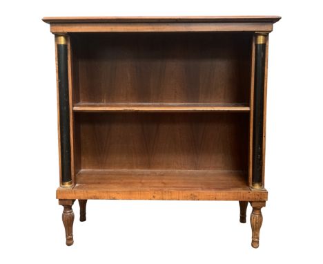 An Empire style small open bookcase with gilt brass mounted ebonised columns width 72cm, height 74cm.From the estate of Ashle