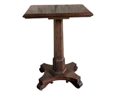 A William IV occasional table on octagonal rosewood pedestal, the concave quadruple base with scrolling feet, the rectangular