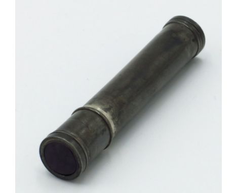 A George III silver cylindrical multiple seal set which contains five glass or stone intaglio carved seals. Condition report: