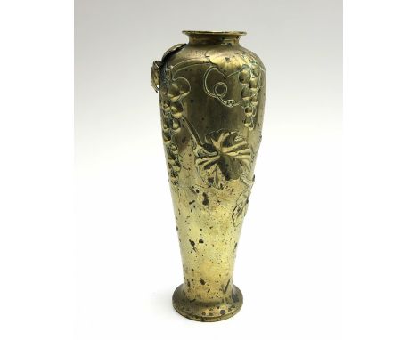 A Japanese brass baluster vase, decorated with fruiting vines, height 36cm. From the estate of Ashley Barker OBE who was born