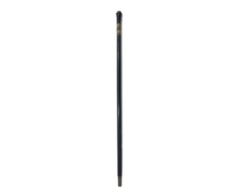 An early 20th century Indian ebonised and carved bone sword stick, with lion's head metal finial, 91cm.