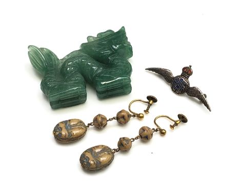 A jade dragon, a pair of Egyptianesque earrings and an enamelled silver RAF ladies brooch.