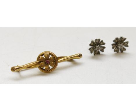 A pair of white gold flower head earrings and 15ct gold bar brooch the central flower head set of ruby.