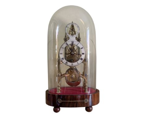 A steeple single fusee brass skeleton clock with silver chaptering beneath a silver second style on brass inlay rosewood stan