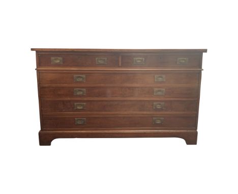 A fine mahogany plan chest, 19th century, the removable top fitted with two short drawers, the base with four long drawers on