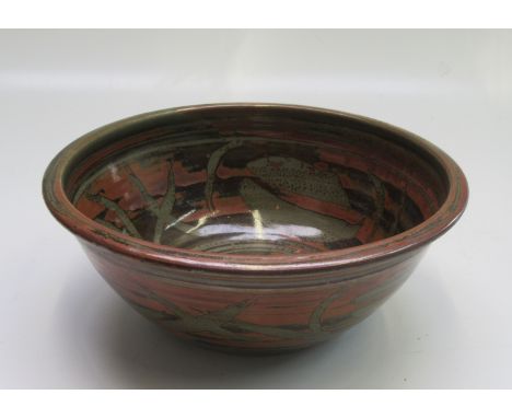 A Crowan Pottery bowl with green and terracotta brown glaze, height 12cm, diameter 19.5cm.From the estate of Ashley Barker OB