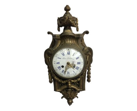 A French ormolu Cartel clock, 19th century, the case with urn finial, classical festoons and pierced scroll work in the class