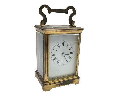 A brass carriage clock, height 13.5cm.