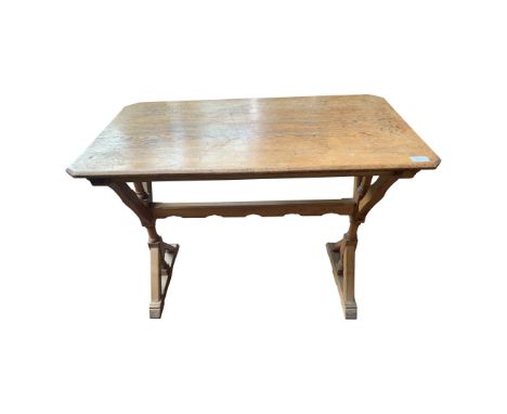 A Puginesque light oak Gothic table with X form supports, the rectangular top 50 x 91cm. From the estate of Ashley Barker OBE