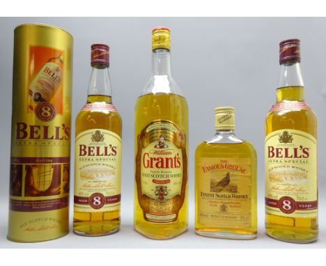 Grant's Family Reserve Finest Scotch Whisky, 1ltr, 43%vol, Bell's Extra Special Old Scotch Whisky in metal tube, & another bo