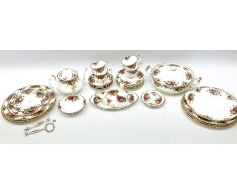 Royal Albert Old Country Roses part dinner and tea service comprising teapot, four tea cups and saucers, eight dessert plates