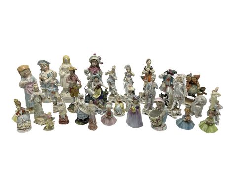 Various continental style porcelain figures to include Victorian examples and others, including figures modelled as fruit pic