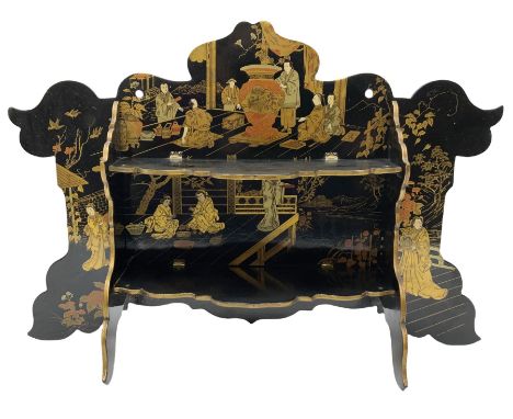 Late 19th/early 20th century black lacquered folding wall shelf or table stand, of shaped form, with two folding shelfs and t