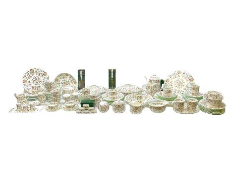 Minton Haddon Hall pattern tea and dinner wares, including basket dish, two covered tureens, six dinner plates, eight dessert