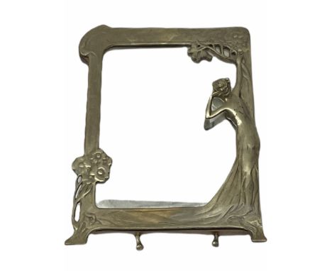 Art Nouveau style mirror in the manner of WMF,  decorated with a female figure and floral motifs, the easel support verso wit
