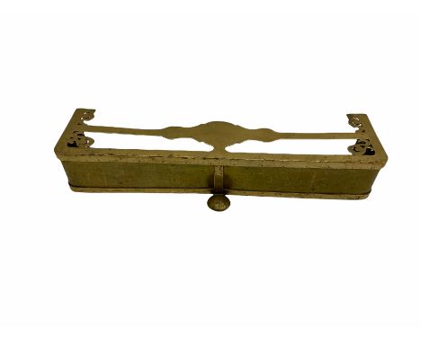 Late Georgian brass fire fender, with shaped and scrolling top, L107cm
