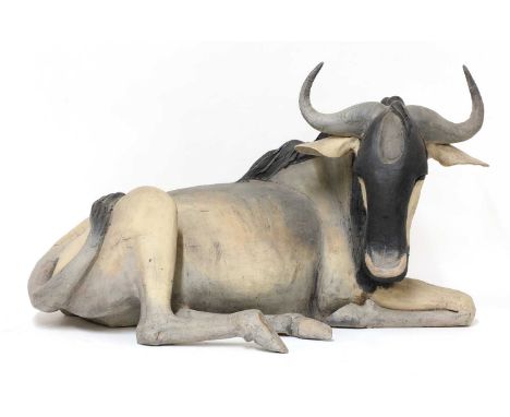 *Nichola Theakston (b.1967)'Wildebeest', the pottery beast depicted at rest64cm long39cm highProvenance: A private collection