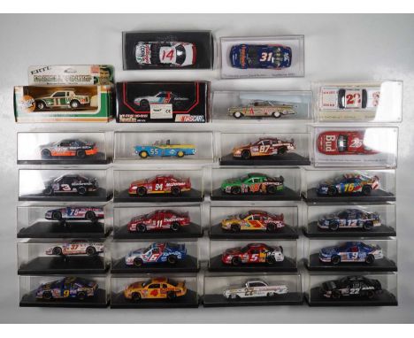 A group of boxed and unboxed 1:43 scale models to include ERTL and QUARTZO, comprising of assorted NASCAR racing cars, VG/E  