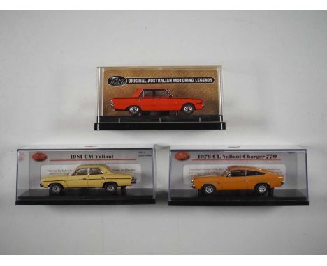 A group of 1:43 scale models of Australian cars by TRAX, comprising of a CM Valiant, CL Valiant Charger 770 and a Chrysler VG