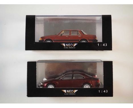 A pair of 1:43 scale hand built resin models by NEO, comprising of a NEO44010 Mazda 626 (1982) and a NEO43780 Mazda Xedos 6 (