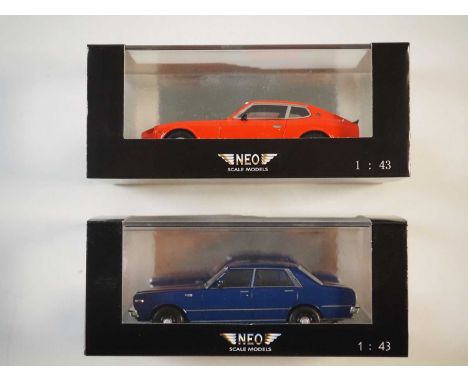 A pair of 1:43 scale hand built resin models by NEO, comprising of a NEO43985 Datsun 260Z (1975) and a NEO44499 Datsun 200L L