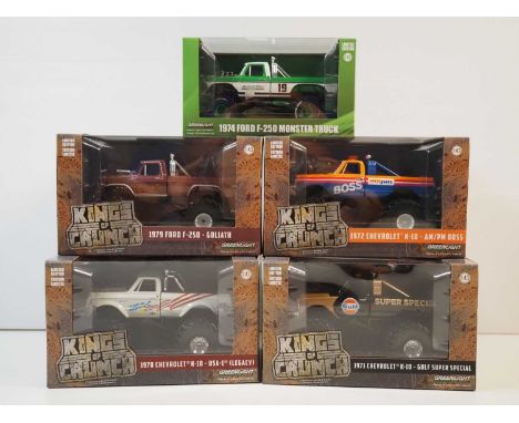 A group of 1:43 scale models by GREENLIGHT, comprising of X4 Kings of Crunch monster trucks plus a 1974 Ford F-250 monster tr