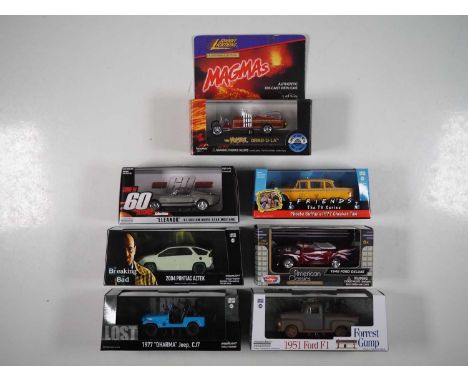 A group of 1:43 scale models by GREENLIGHT, MOTOR MAX and JOHNNY LIGHTNING, comprising various cars from American movies and 