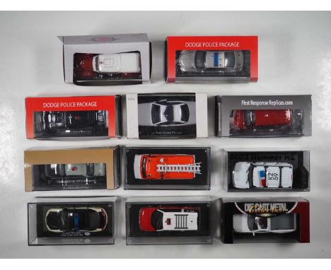 A group of 1:43 scale models to include FIRST RESPONSE, mostly American police cars and other emergency vehicles VG/E in G/VG