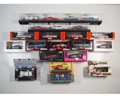 A group of boxed 1:43 scale models by LEGENDS OF RACING, QUARTZO, REVELL, RACING LEGENDS, VITESSE, ROAD CHAMPS and ROAD CHAMP