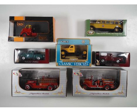 A group of 1:43 scale models to include ERTL and IXO, comprising of American commercial vehicles, VG/E in G/VG boxes (7)