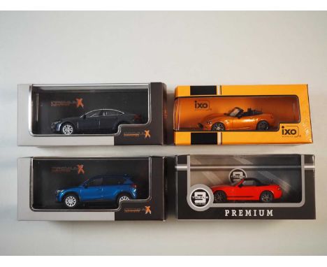 A group of 1:43 scale models by PREMIUM X, TRIPLE 9 and IXO, comprising of assorted Mazda automobiles to include a PREMIUM X 