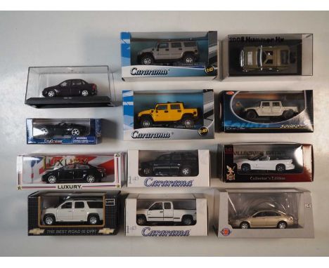 A group of boxed and 2 unboxed 1:43 scale models to include CARARAMA, AMERICAN HERITAGE MODELS and SOLIDO, comprising of asso